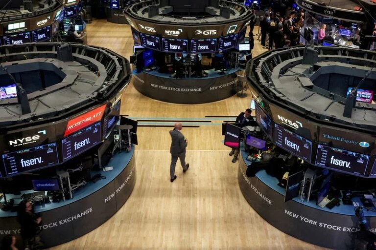 Wall St futures tick up as investors weigh earnings; PayPal jumps