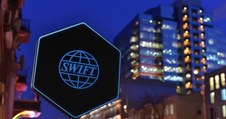 Swift recruits big banks to test its new blockchain ledger